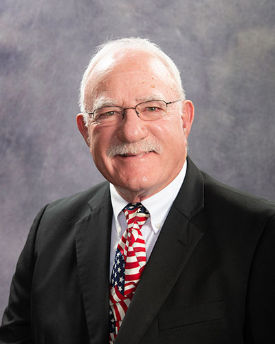 Portrait photograph of Senator John Fuller