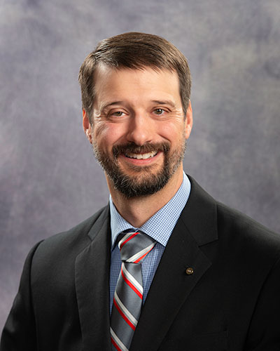 Portrait photograph of Senator Forrest Mandeville