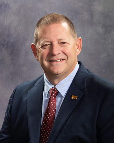 Portrait photograph of Representative Ed Buttrey